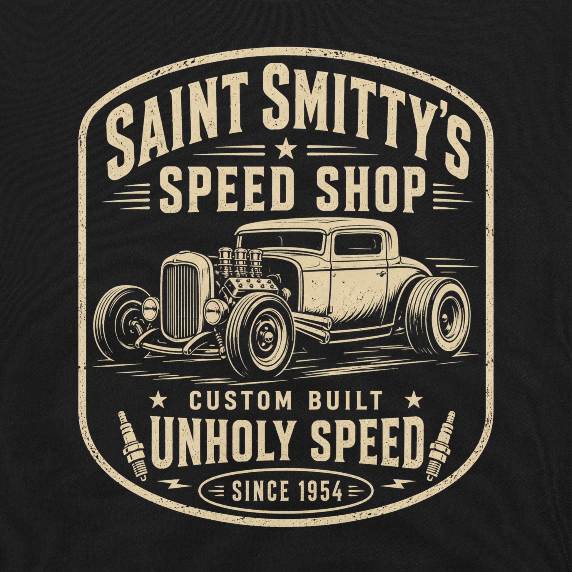 A black graphic tee featuring original Cinderpoint Studios artwork for Saint Smitty’s Speed Shop, a one-color retro hot rod garage design with vintage lettering, classic coupe artwork, spark plugs, and Custom Built Unholy Speed text.