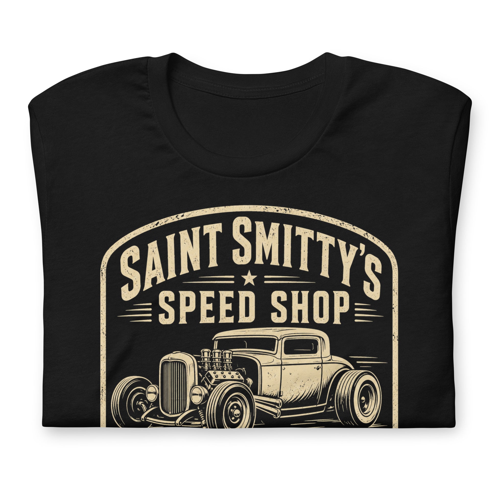A black graphic tee featuring original Cinderpoint Studios artwork for Saint Smitty’s Speed Shop, a one-color retro hot rod garage design with vintage lettering, classic coupe artwork, spark plugs, and Custom Built Unholy Speed text.