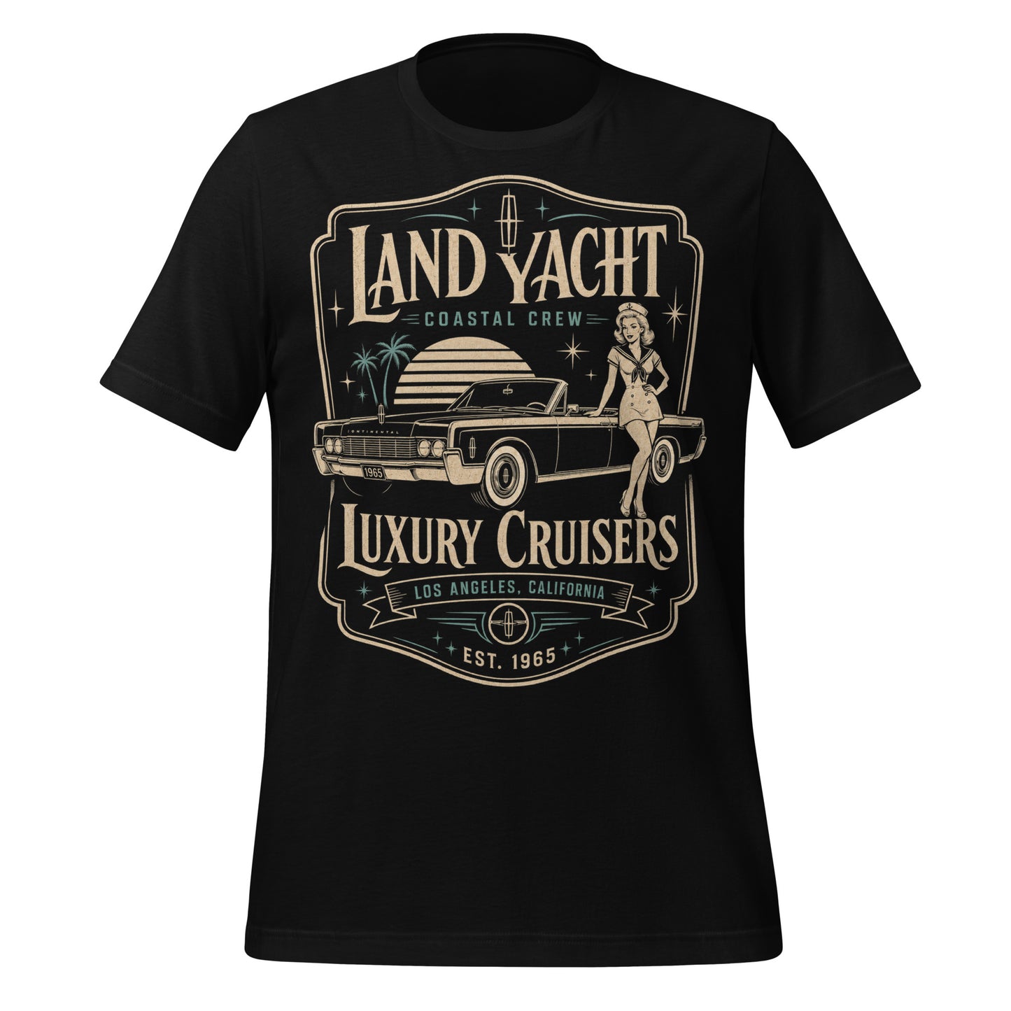 A black graphic tee featuring original Cinderpoint Studios artwork for Land Yacht Luxury Cruisers, a retro classic car design with a 1960s luxury convertible inspired by the 1965 Continental, a sailor pinup, atomic accents, palm trees, and bold vintage lettering.