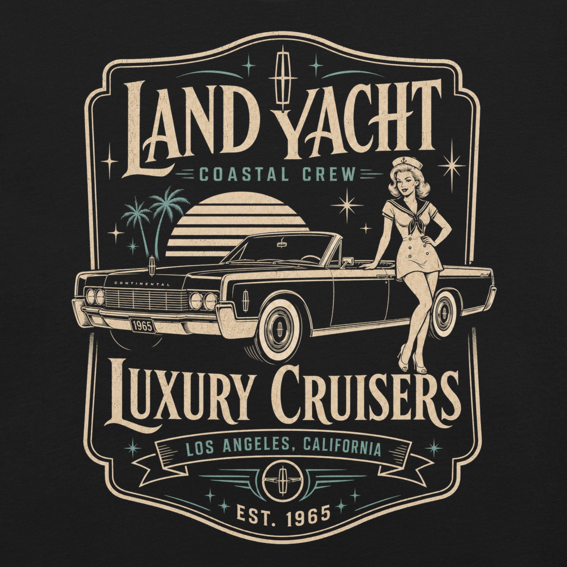 A black graphic tee featuring original Cinderpoint Studios artwork for Land Yacht Luxury Cruisers, a retro classic car design with a 1960s luxury convertible inspired by the 1965 Continental, a sailor pinup, atomic accents, palm trees, and bold vintage lettering.