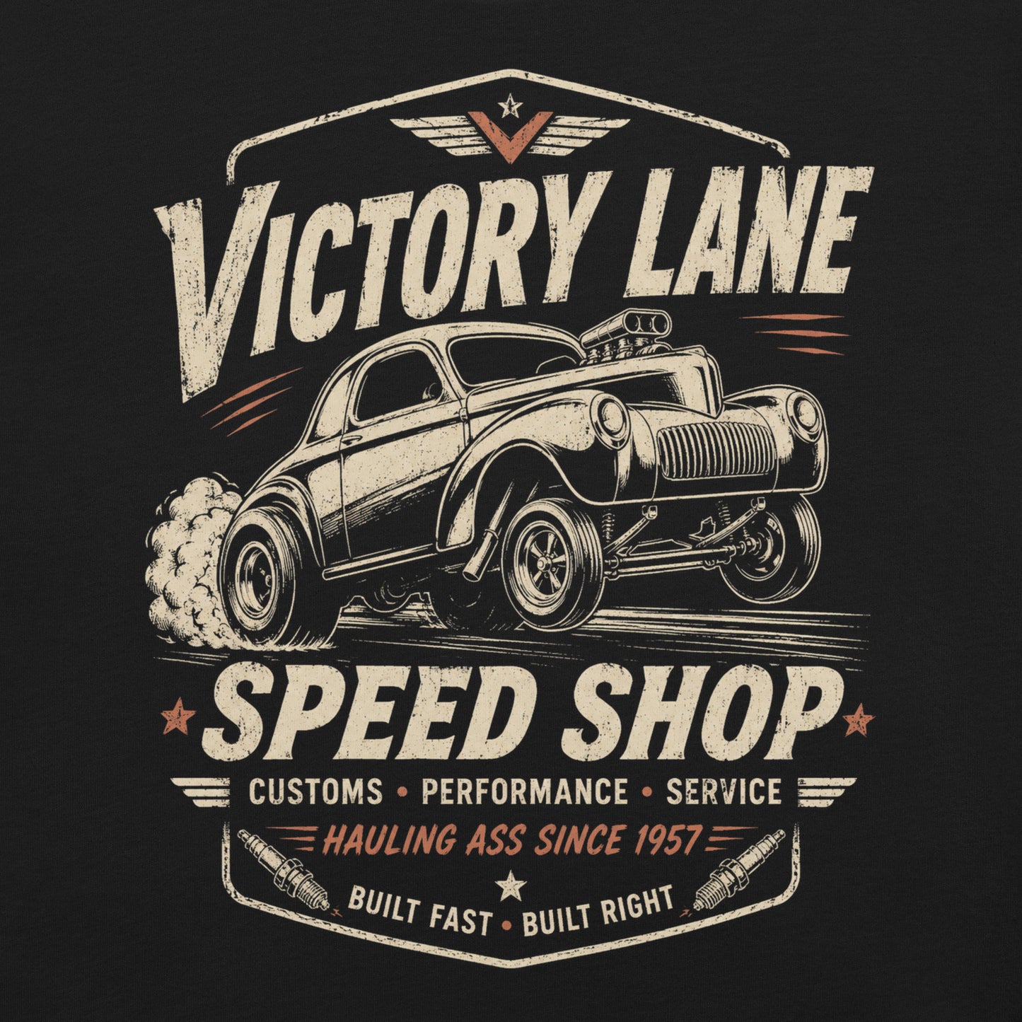 Black graphic tee featuring original Cinderpoint Studios artwork for Victory Lane Speed Shop, a retro hot rod design with a gasser-style car launching hard, bold vintage lettering, spark plug accents, orange speed details, and Built Fast Built Right text.