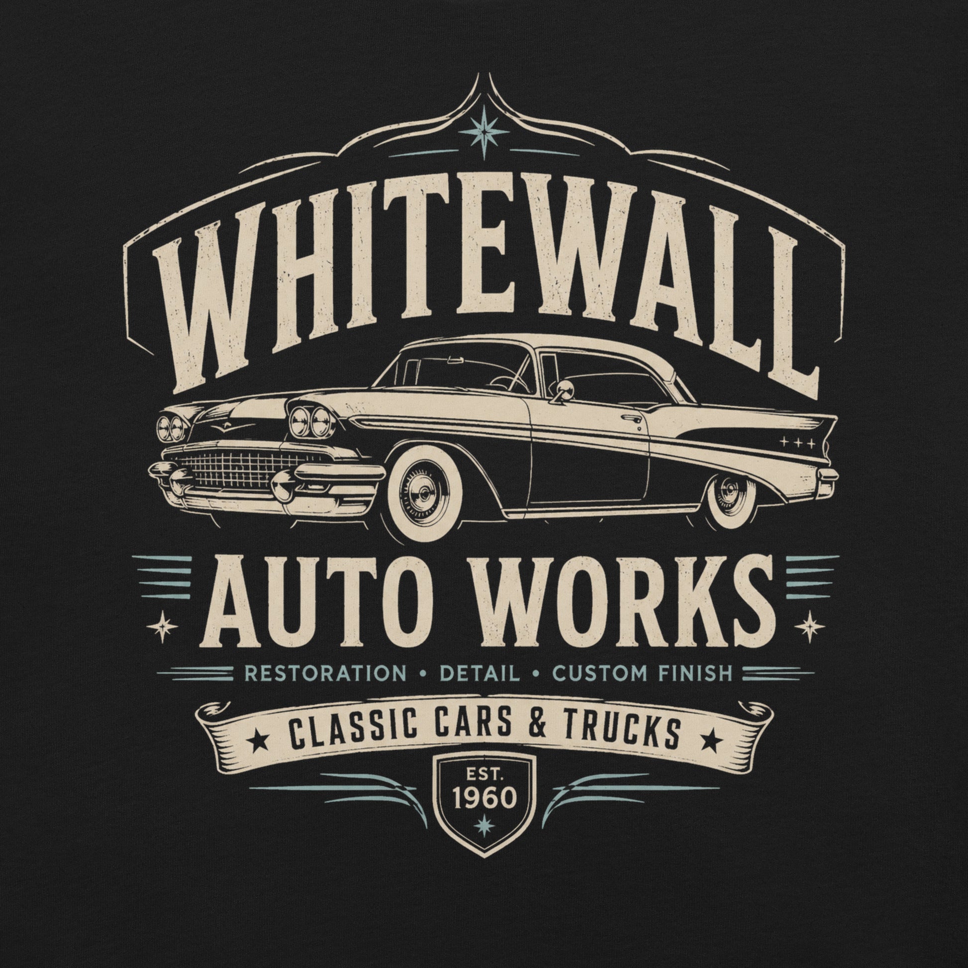 Black graphic tee featuring original Cinderpoint Studios artwork for Tailfin Classics, a retro auto service center design with a 1950s-style classic car, bold tailfins, vintage lettering, teal accents, crossed wrenches, spark plugs, and Alignment Brakes Suspension text.