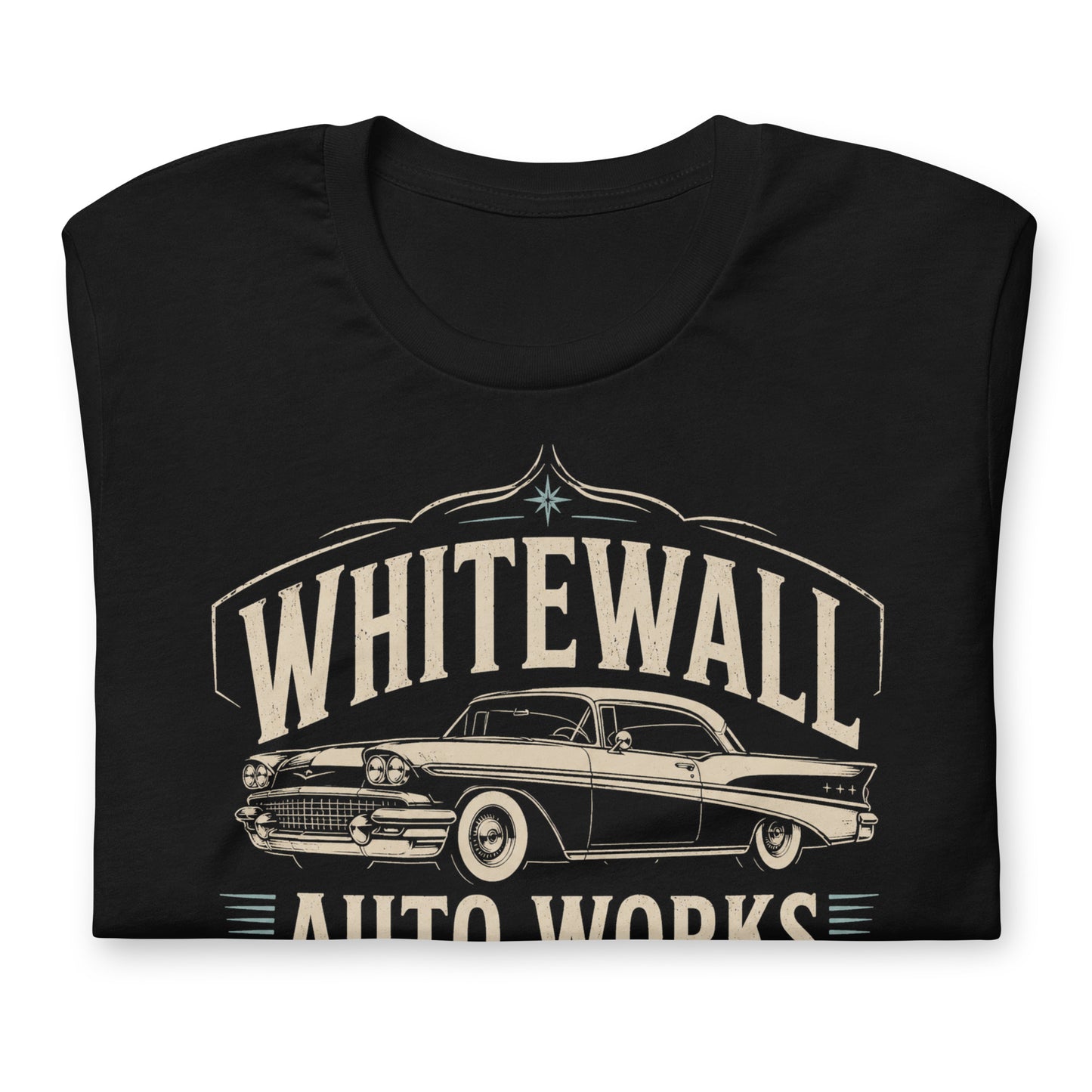 Black graphic tee featuring original Cinderpoint Studios artwork for Tailfin Classics, a retro auto service center design with a 1950s-style classic car, bold tailfins, vintage lettering, teal accents, crossed wrenches, spark plugs, and Alignment Brakes Suspension text.