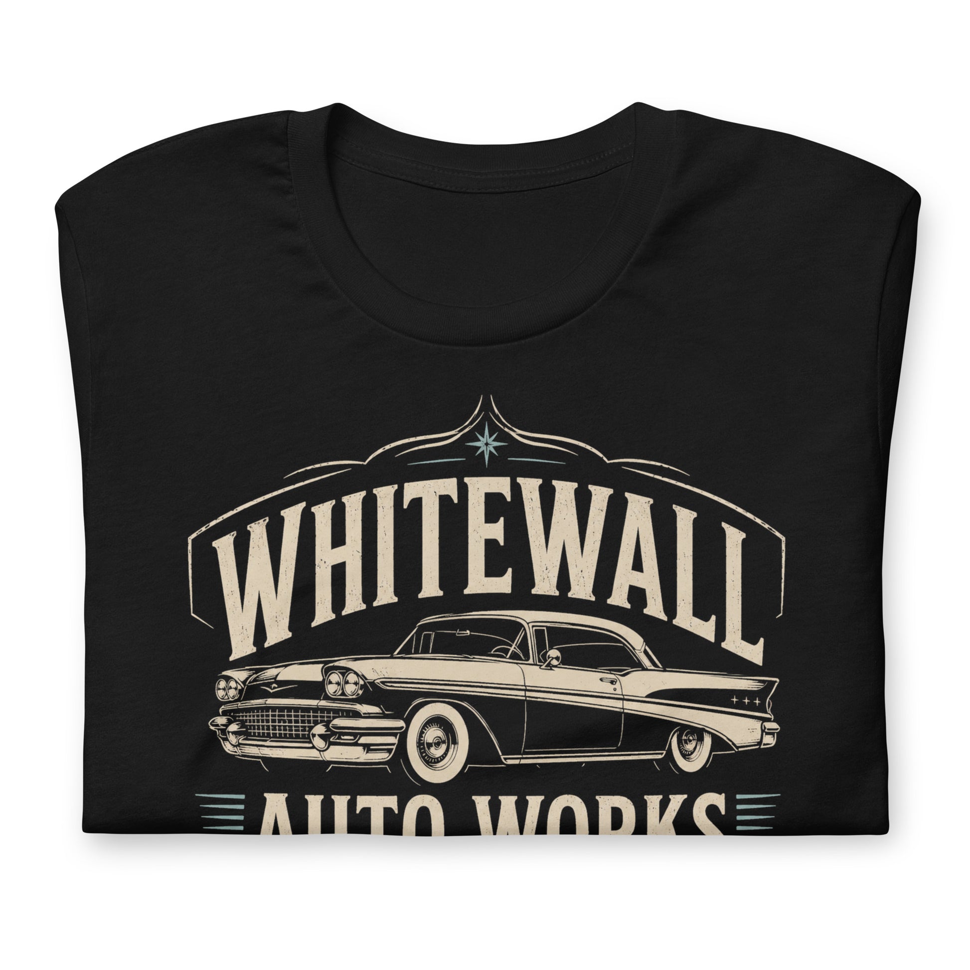 Black graphic tee featuring original Cinderpoint Studios artwork for Tailfin Classics, a retro auto service center design with a 1950s-style classic car, bold tailfins, vintage lettering, teal accents, crossed wrenches, spark plugs, and Alignment Brakes Suspension text.