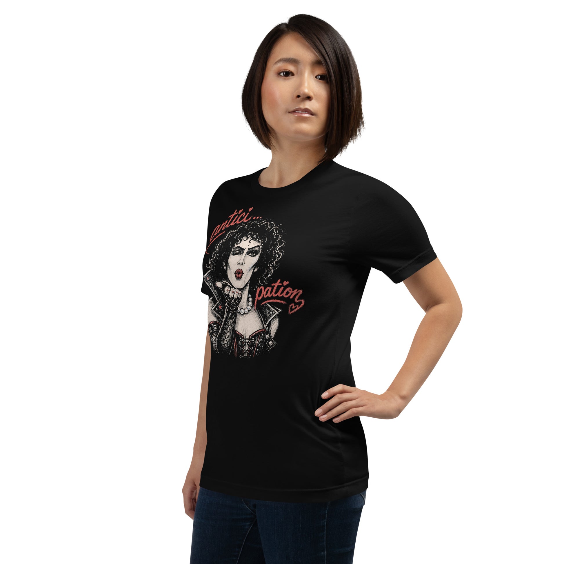 A gritty, high-contrast artistic portrait of Frank N. Furter on a black t-shirt, featuring his iconic curls and makeup with the word "ANTICIPATION" in distressed lipstick lettering.