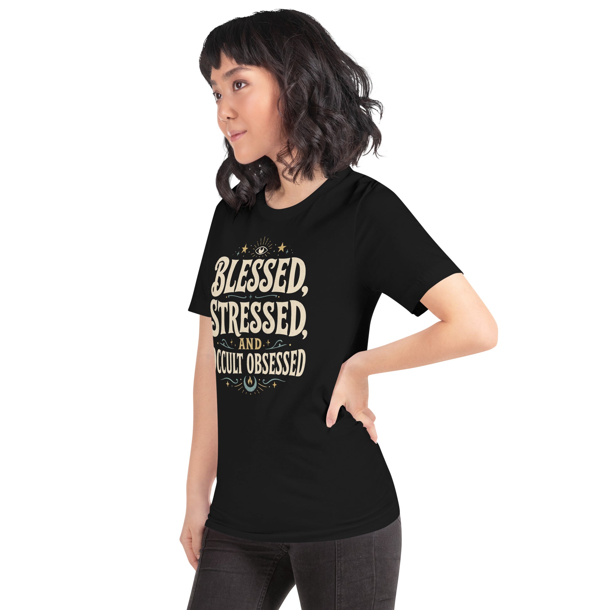 Woman wearing black Blessed Stressed and Occult Obsessed witchy graphic tee with cream lettering and gold accents