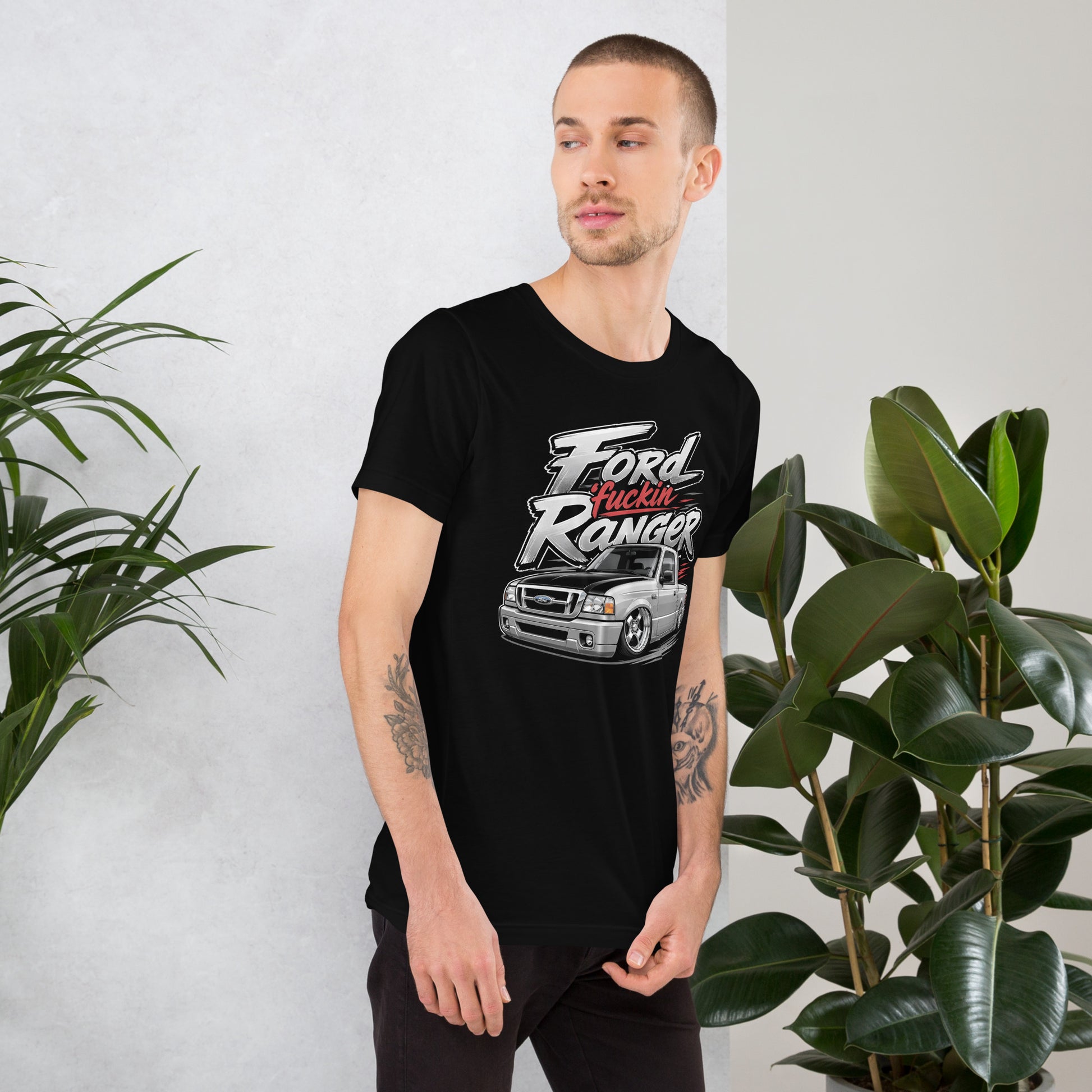 A graphic on a black t-shirt featuring a custom lowered/slammed Ford Ranger mini truck with "Ford Fuckin Ranger" in bold, gritty lettering.