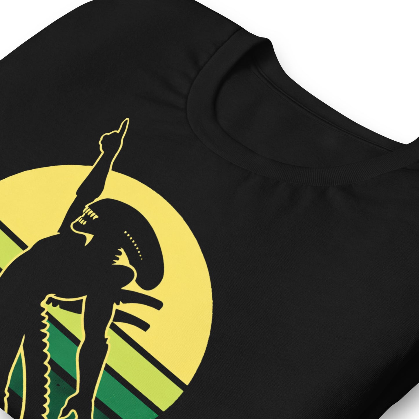 A retro-style graphic t-shirt featuring a Xenomorph alien in the iconic Saturday Night Fever disco pose against a vibrant 1970s sunburst background.