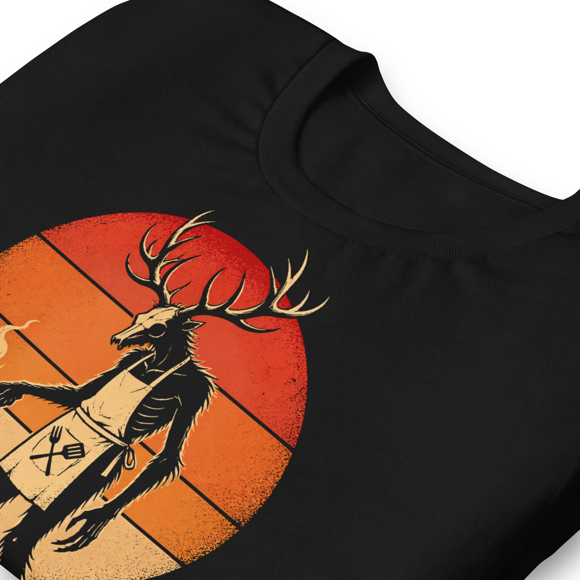 A retro-style graphic t-shirt featuring a Wendigo cryptid with antlers wearing a BBQ apron and grilling at a spatula, set against a vibrant 1980s neon sunset background.
