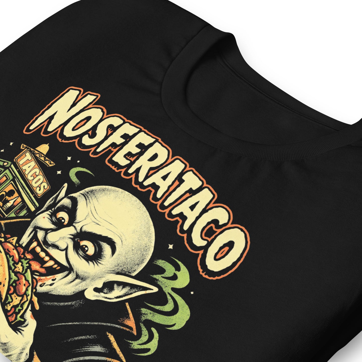 A retro horror-style graphic t-shirt featuring the vampire Nosferatu holding a taco, with "Nosferataco" in stylized, campy cinematic lettering.