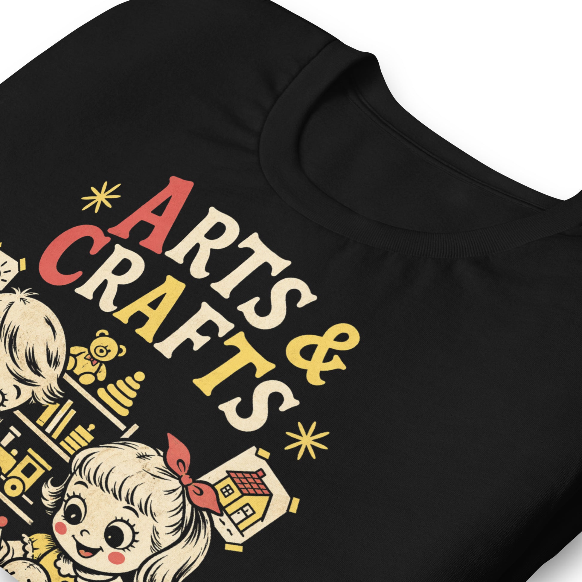 A retro-style graphic t-shirt featuring a creepy-cute voodoo doll with "Arts & Crafts" in stylized, vintage-inspired lettering, perfect for dark humor and goth fans.