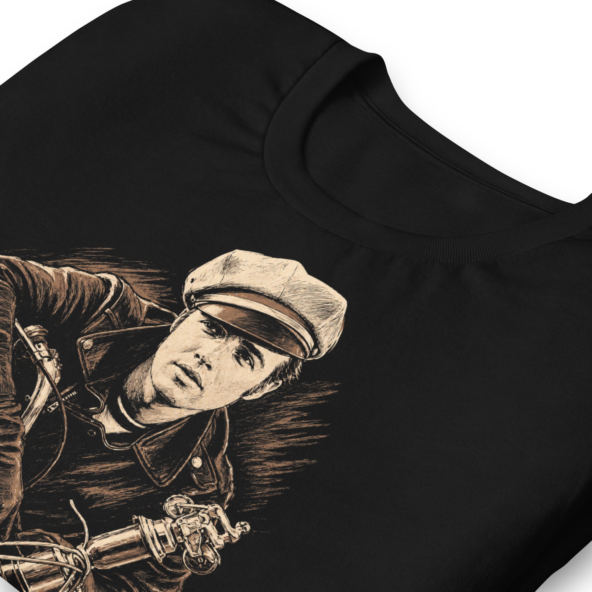 A high-contrast artistic portrait of Marlon Brando as Johnny from The Wild One on a black t-shirt, featuring his iconic tilted biker cap and leather jacket.
