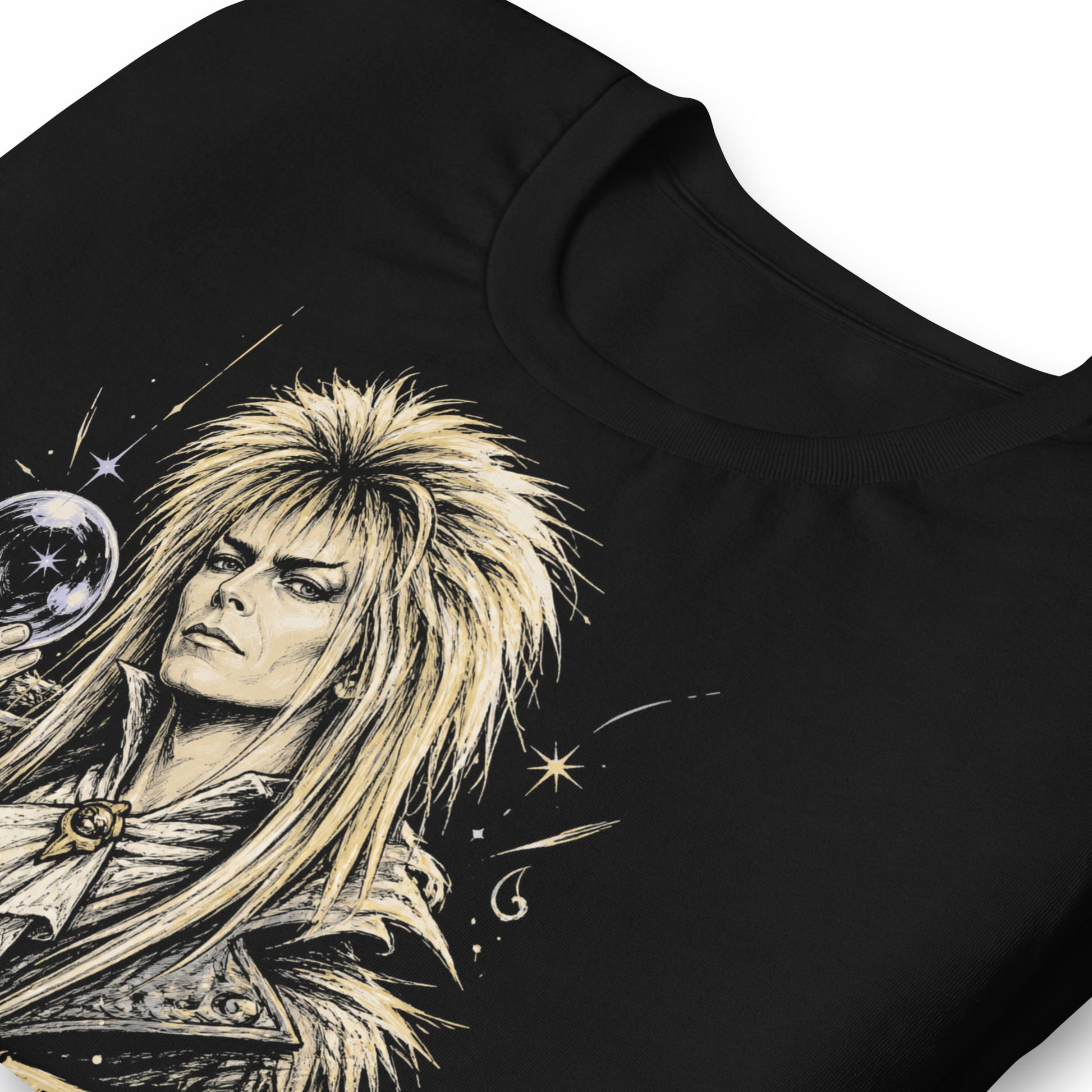A gritty, high-contrast artistic portrait of Jareth the Goblin King on a black t-shirt, featuring his iconic 80s glam hair and a crystal ball with a starburst.