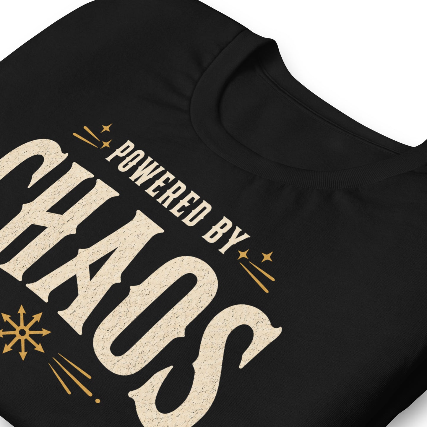 Powered by Chaos t-shirt on black Bella Canvas tee with vintage cream typography and occult symbol accents