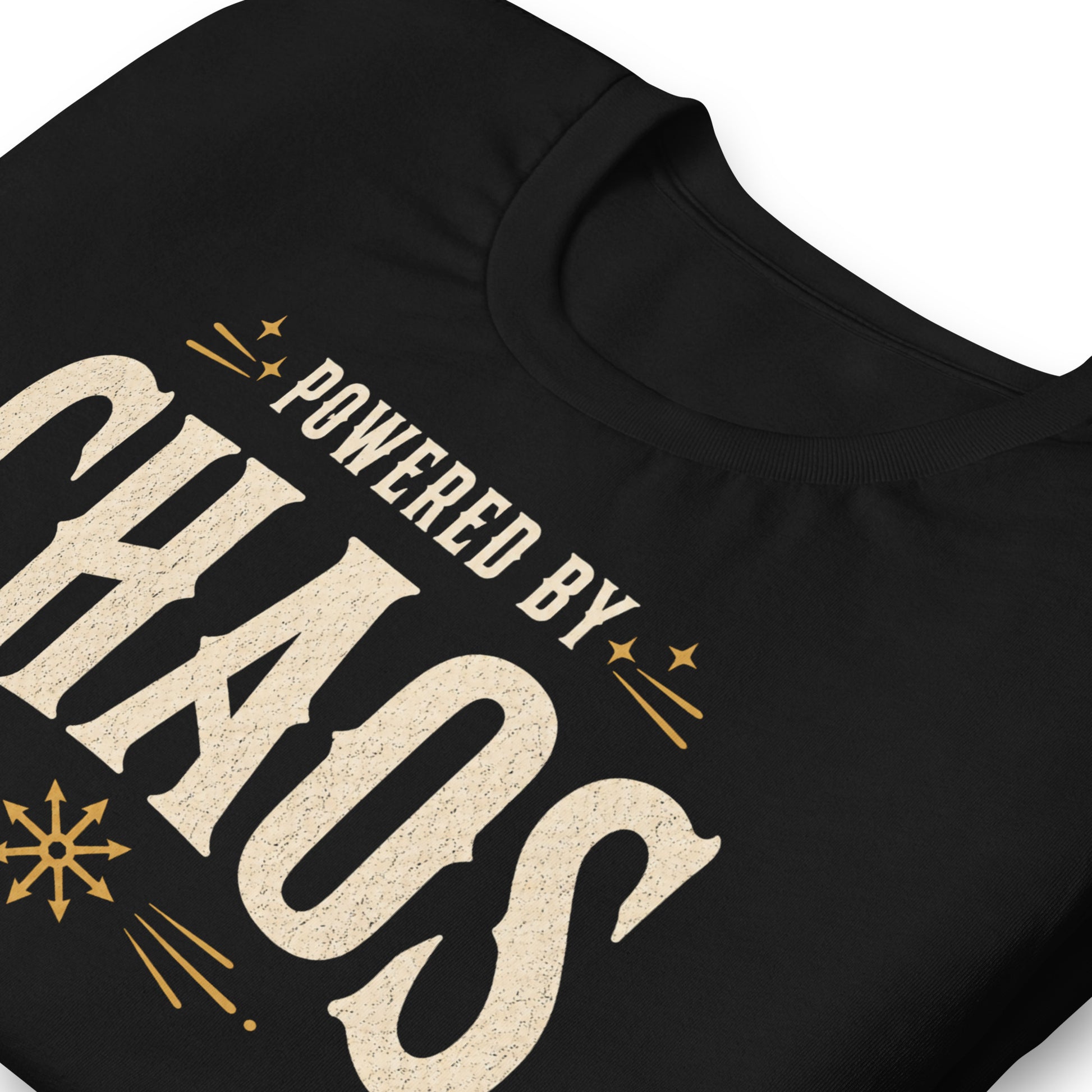 Powered by Chaos t-shirt on black Bella Canvas tee with vintage cream typography and occult symbol accents