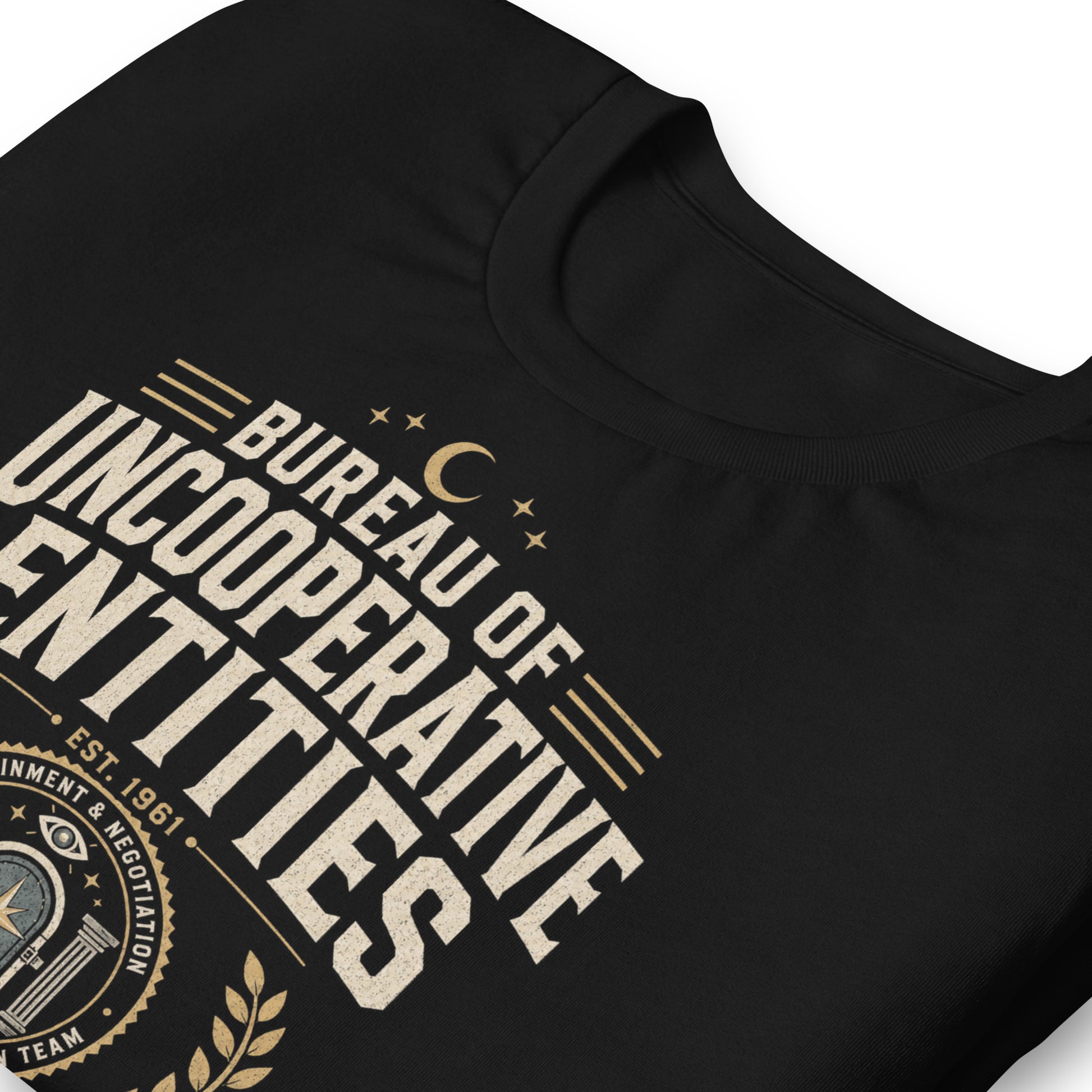 Close-up of Bureau of Uncooperative Entities t-shirt design with field response unit banner and active case files text