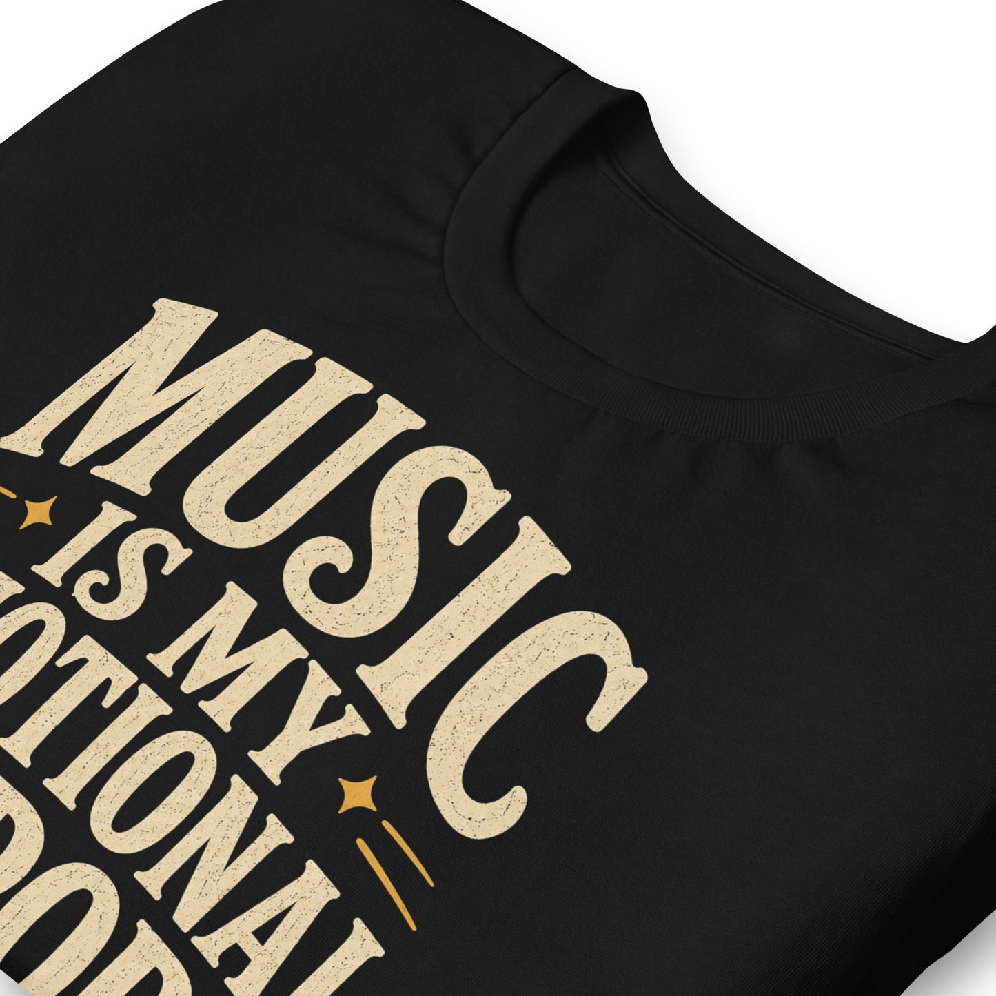 Close up of a graphic tee featuring original Cinderpoint Studios artwork for Music Is My Emotional Support, a retro music lover design with bold vintage lettering, star accents, and a cassette tape illustration.