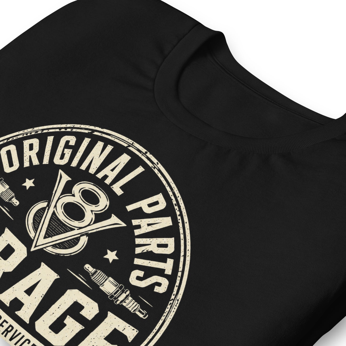 A black graphic tee featuring original Cinderpoint Studios artwork for Original Parts Garage, a one-color classic car service badge design with bold lettering, V8 emblem, spark plugs, Classic Car Service banner, Factory Correct text, and Road Tested details.