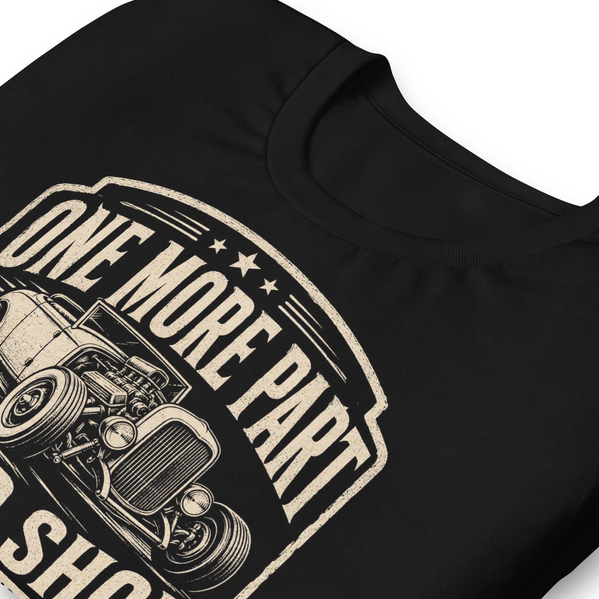 A black graphic tee featuring original Cinderpoint Studios artwork for One More Part Speed Shop, a funny vintage speed shop design with a classic hot rod, bold lettering, spark plug details, and the slogan Go Fast the Expensive Way.